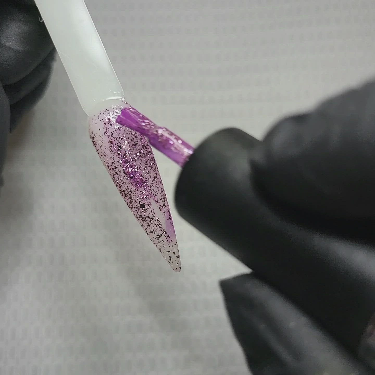 Tiara Platinum Pink Metallic Glitter HEMA Free Gel Nail Polish Diamonds & Gloss Australia Video Painting a Nail Swatch Stick with cruelty free and vegan Gel Polish which can be used on acrylic, builder gel and polygel nails.